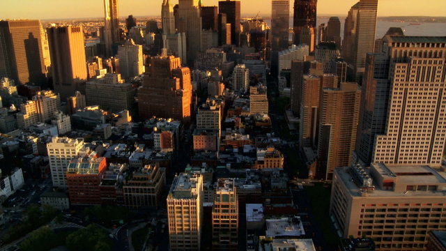 Aerial view of the Setting Sun over Manhattan and Iconic Skyscrapers, NY, USA