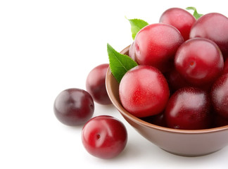 Ripe plums in a plate