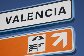 Valencia Beach Sign against Blue Sky Background