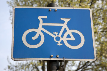Blue Bike Lane Sign in Urban Setting