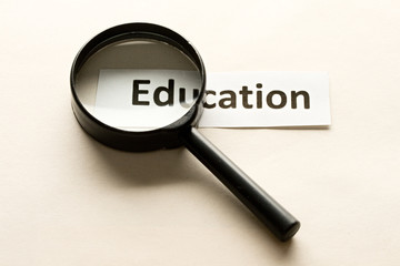 Magnifying glass and card