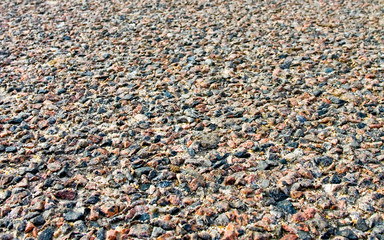 uneven covering of stone road