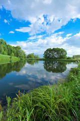 Fototapeta na wymiar picturesque scene of beautiful rural lake