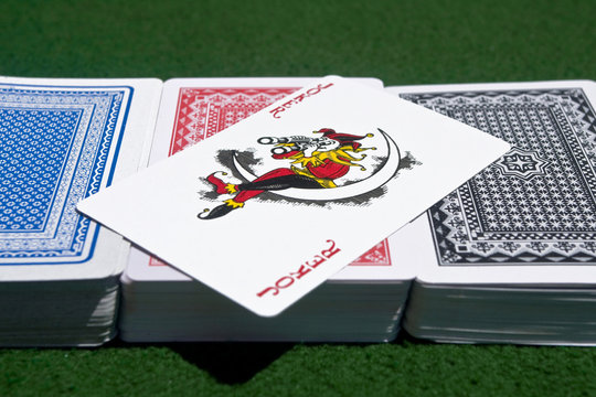 Card decks with a Joker