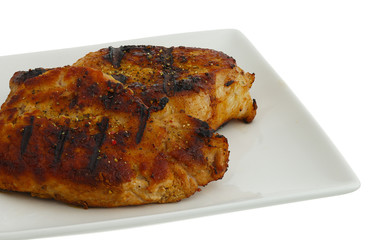 Grilled chops on square plate