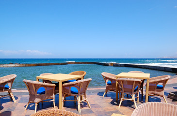 Fototapeta na wymiar Outdoor restaurant at the seafront, Tenerife island, Spain