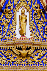 Fototapeta na wymiar Buddha statues in the temple sanctuary.