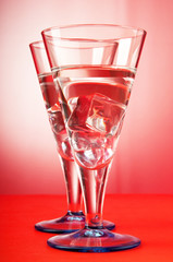 Water in the glass against gradient background