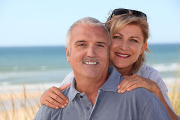 Fototapeta premium portrait of a couple on the beach