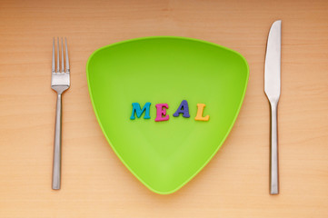 Plate with letters on the white background