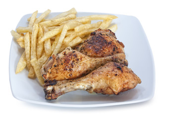 Muslos de pollo con patatas.