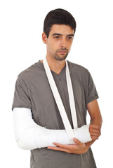Unhappy man with broken hand thinking