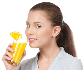 Young woman with glass of orange juice isolated