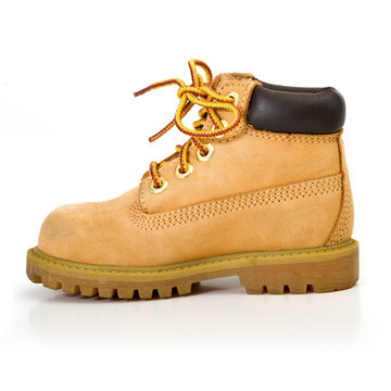 Yellow Kid's boot isolated on White.