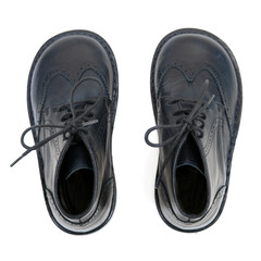 Pair of black Kid's shoes isolated on White.