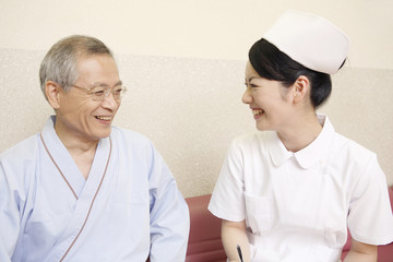 Obraz premium 看護師と患者