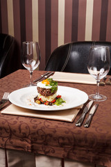 beef burger with egg and potatoes