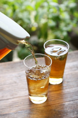 serving mugicha , japanese cold barley tea