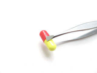 Pill and pincer