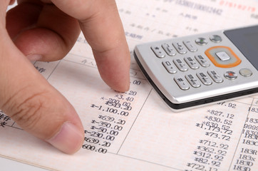 Cell phone and bank book