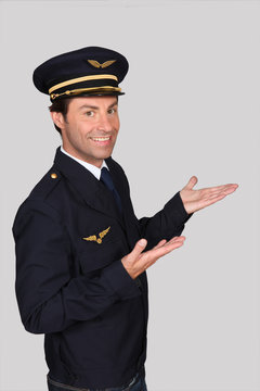 Man dressed in airline pilot costumer
