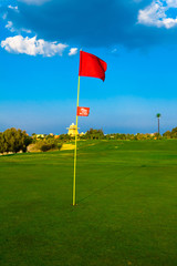 Obraz premium Golf Flag Spread On The Wind