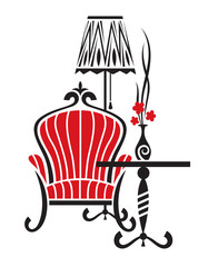 armchair with table and floor lamp