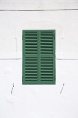 green wood shutter window