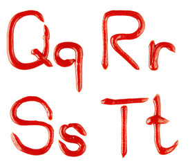 letters made of ketchup on white background