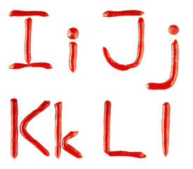 letters made of ketchup on white background
