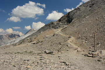 twisting footpath across scree