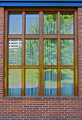 Wood bordered window reflection