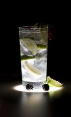 Refreshment cocktail with lemon and lime