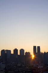 Naklejka premium 新宿高層ビル群と朝日