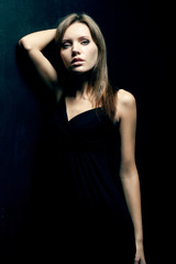 Naklejka premium woman wearing black dress