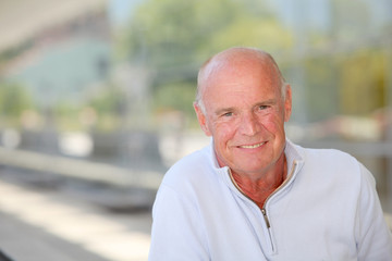 Portrait of handsome senior man with blue sweater