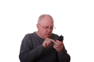 Older Balding Guy in Gray Shirt Trying to Dial a Phone