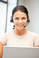 helpline operator with laptop computer