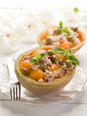 rice salad over open melon