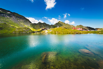 Naklejka na ściany i meble Lake and mountain (Balea Lake in Romania)