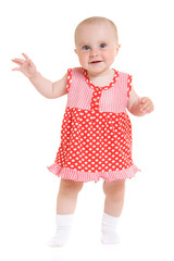 Baby in dress on a white background.