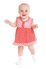 Baby in dress on a white background.