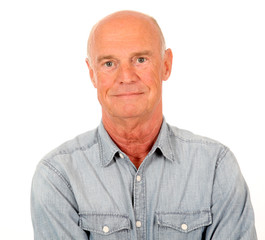 Fototapeta premium Portrait of smiling senior man with blue shirt