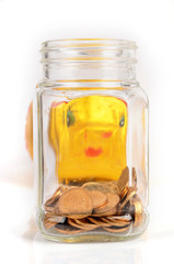 A money jar and piggy bank