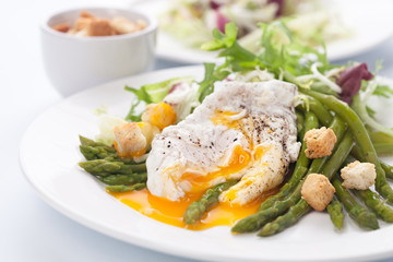 Breakfast with asparagus,eggs and tomato