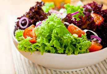 Summer salad with green and red lettuce leaves