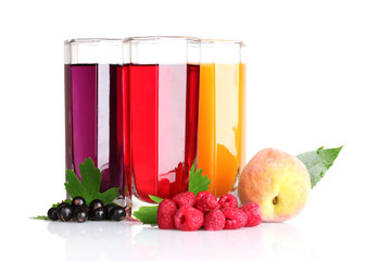 fresh summer berries and juice isolated on white