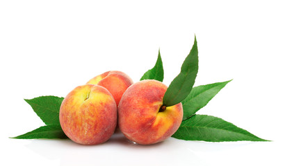 Fresh peaches isolated on white