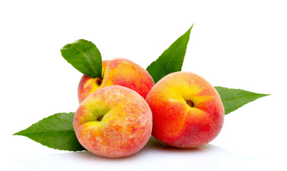 Fresh peaches isolated on white