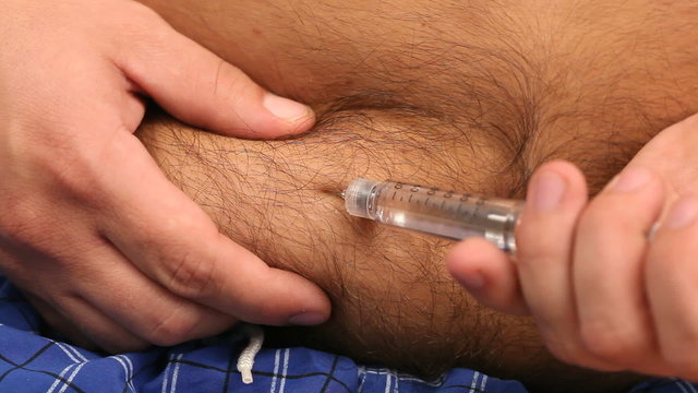 injecting insulin